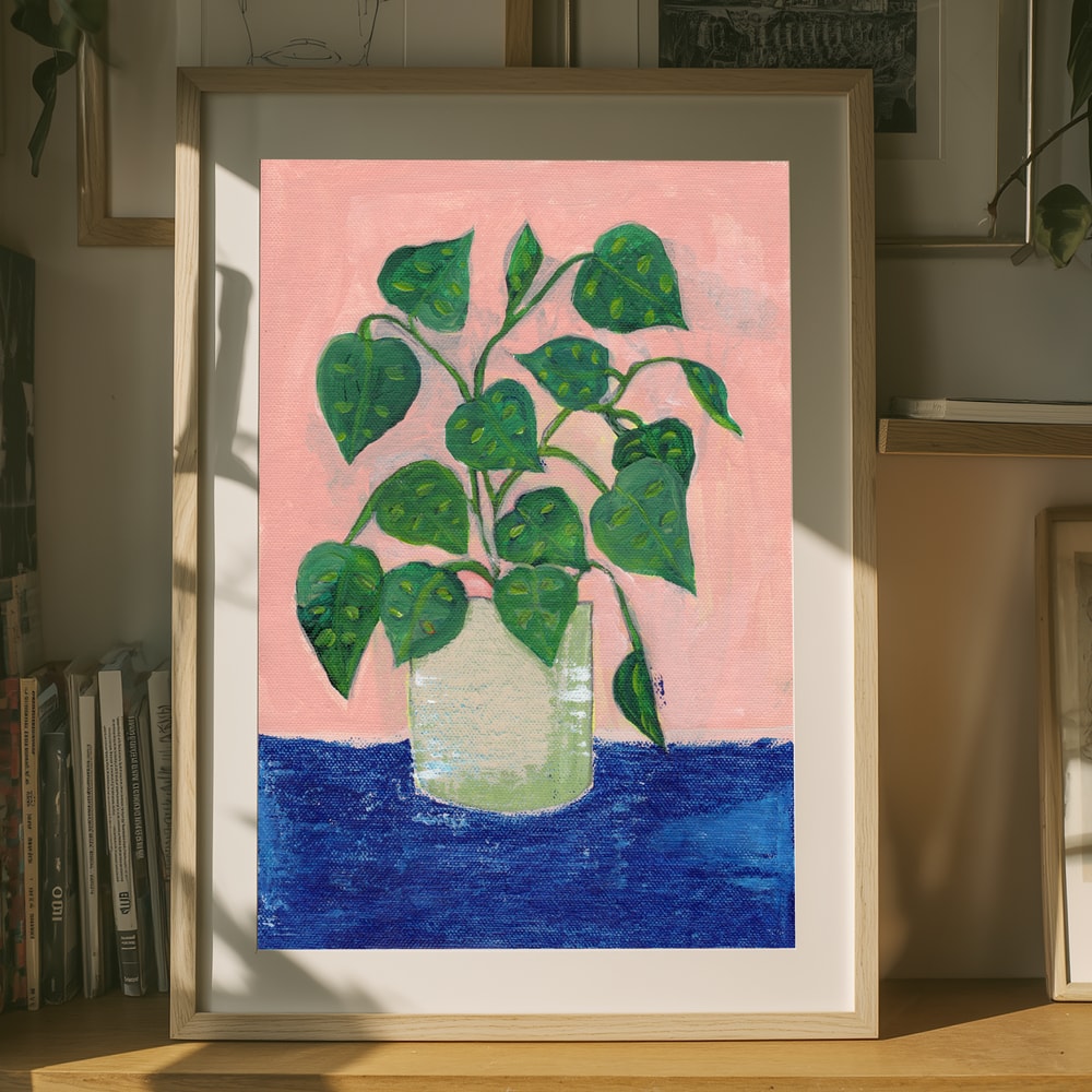 Poster mit einer farbenfrohen Topfzimmerpflanze