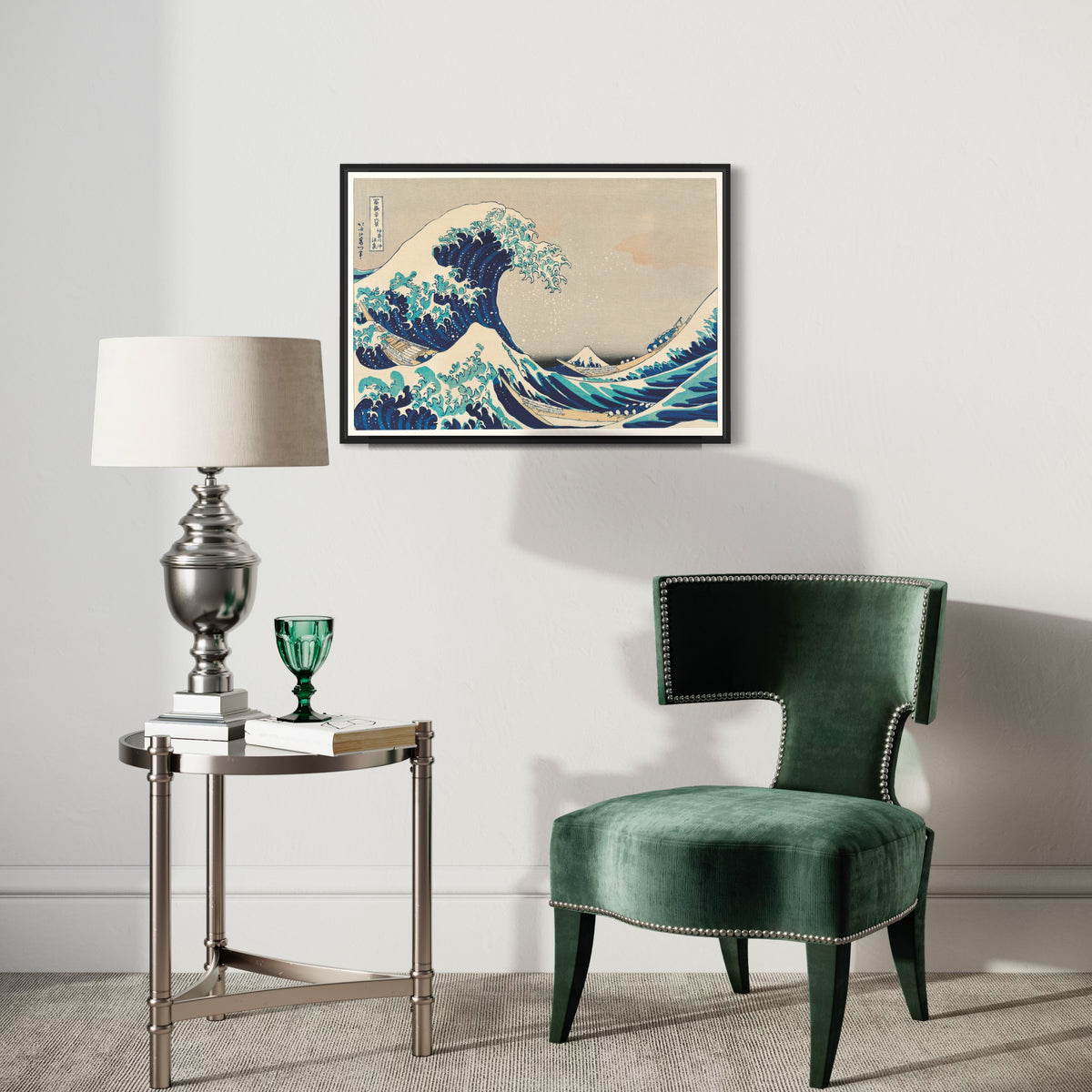 Stylish living room with framed wave art poster, green velvet chair, modern lamp on side table