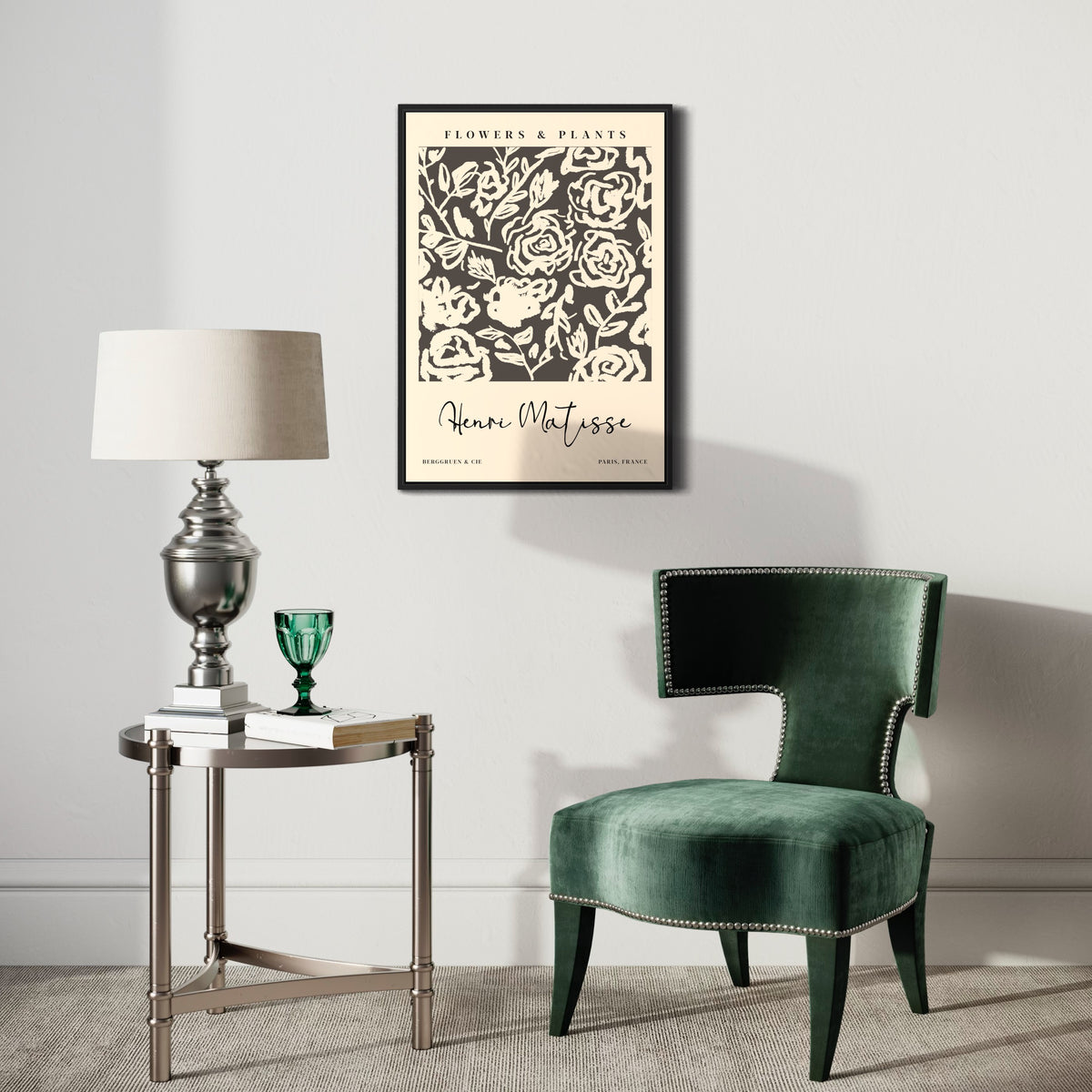 Modern living room with green velvet chair, round side table, and floral art poster on wall.