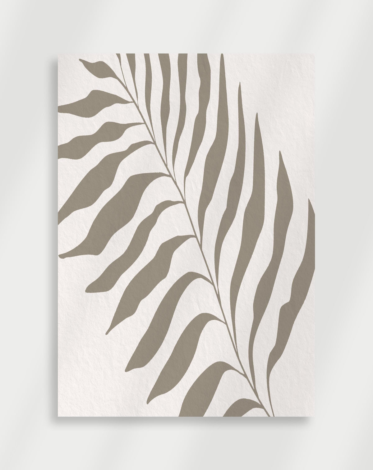 Boho palm leaf silhouette poster with a minimalist taupe silhouette of a palm leaf on a white background