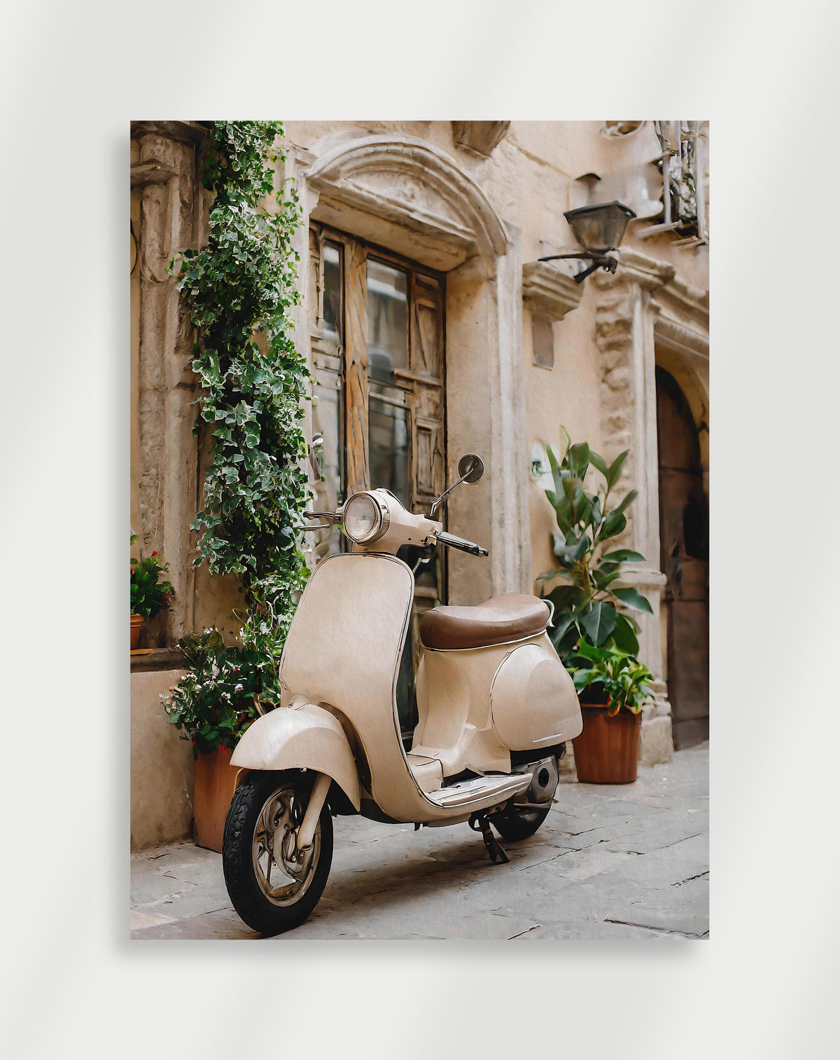 Cream scooter poster with a cream vintage scooter parked by a stone building with ivy and plants