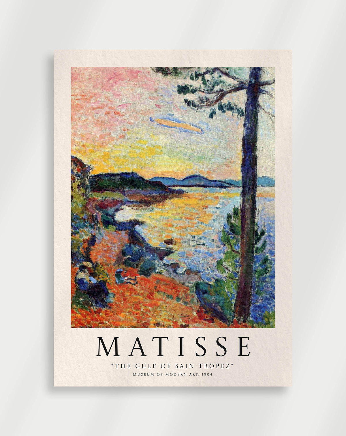 A poster of Matisse's artwork 'The Gulf of Saint-Tropez' featuring vibrant colors and a beach scene with trees in the background.