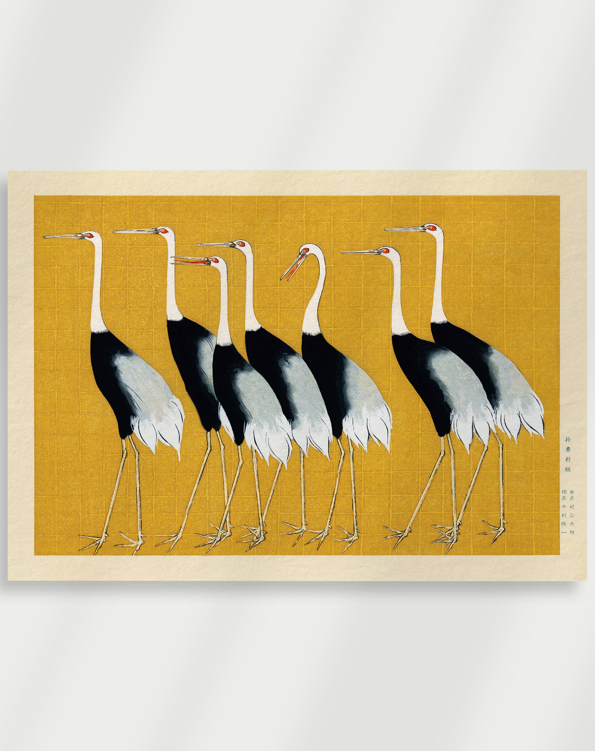 Japandi cranes on gold poster with a row of black, white and gray cranes