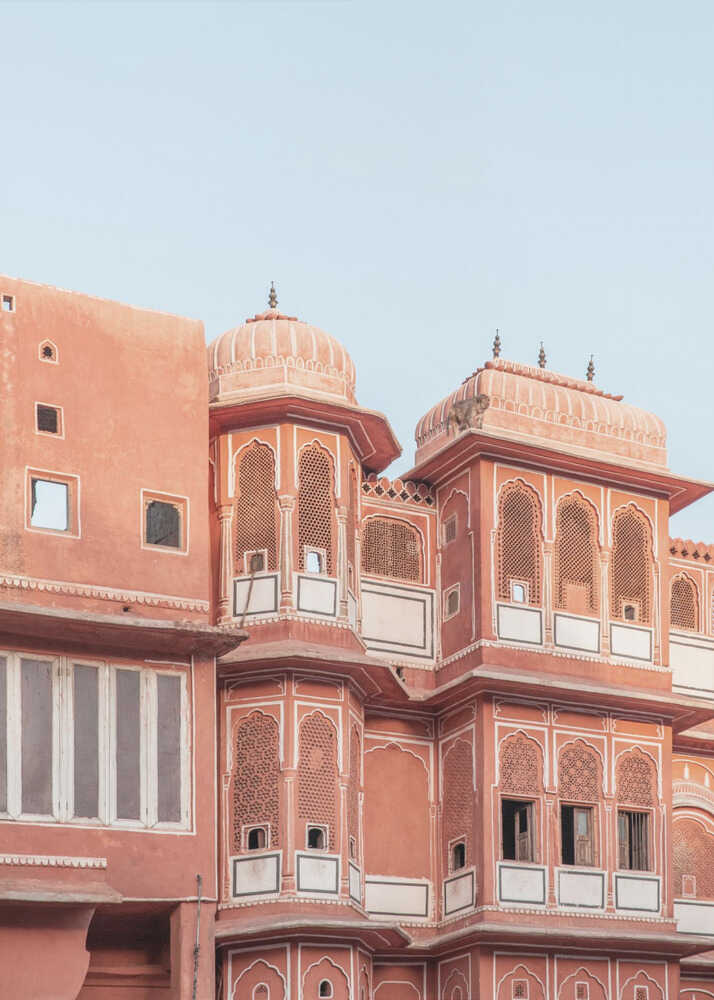 Pink palace poster with ornate pink palace architecture with domes and lattice windows