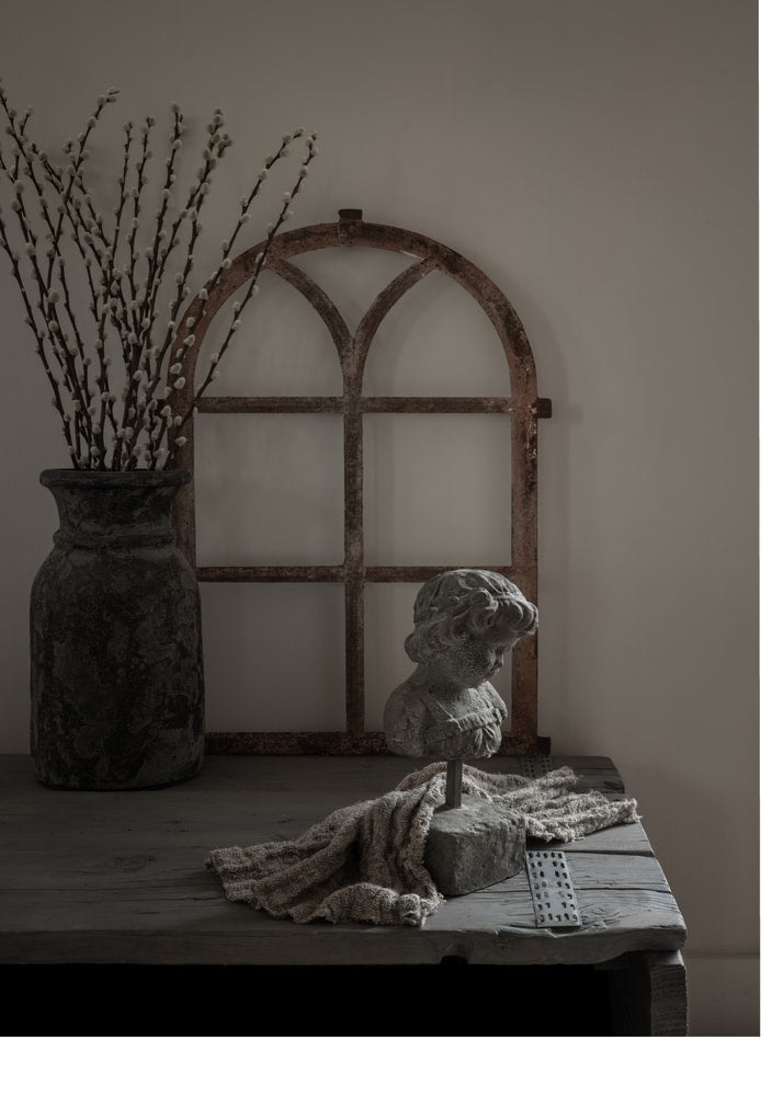 Vase bust window poster with a dark vase of branches, a stone bust and an arched window frame