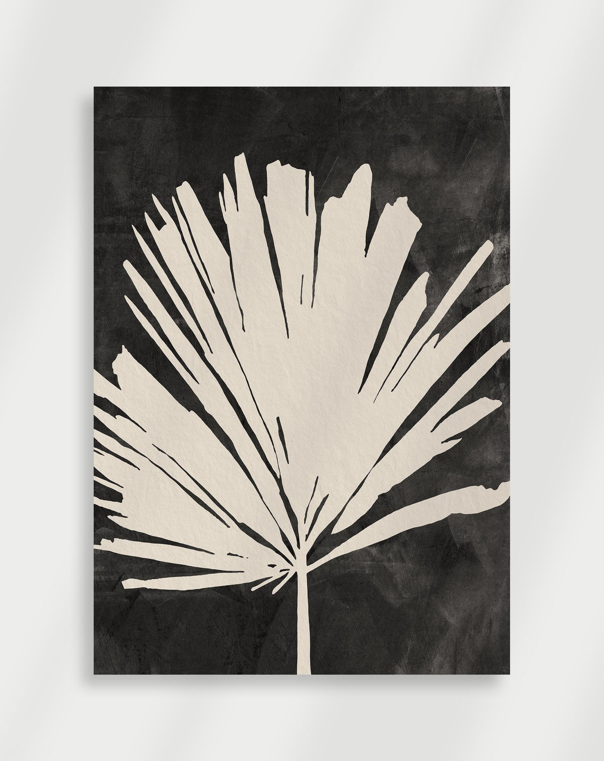 White palm leaf silhouette poster with a bold white silhouette of a palm leaf on a textured black background